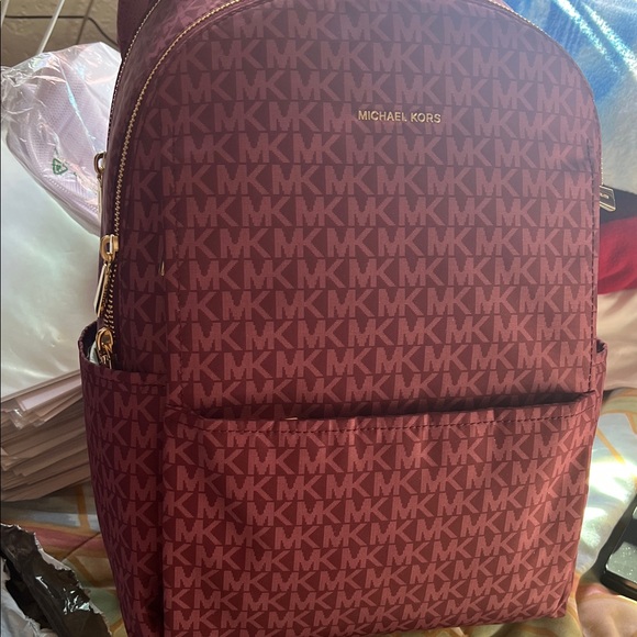 Michael Kors Mulberry and Gold Backpack